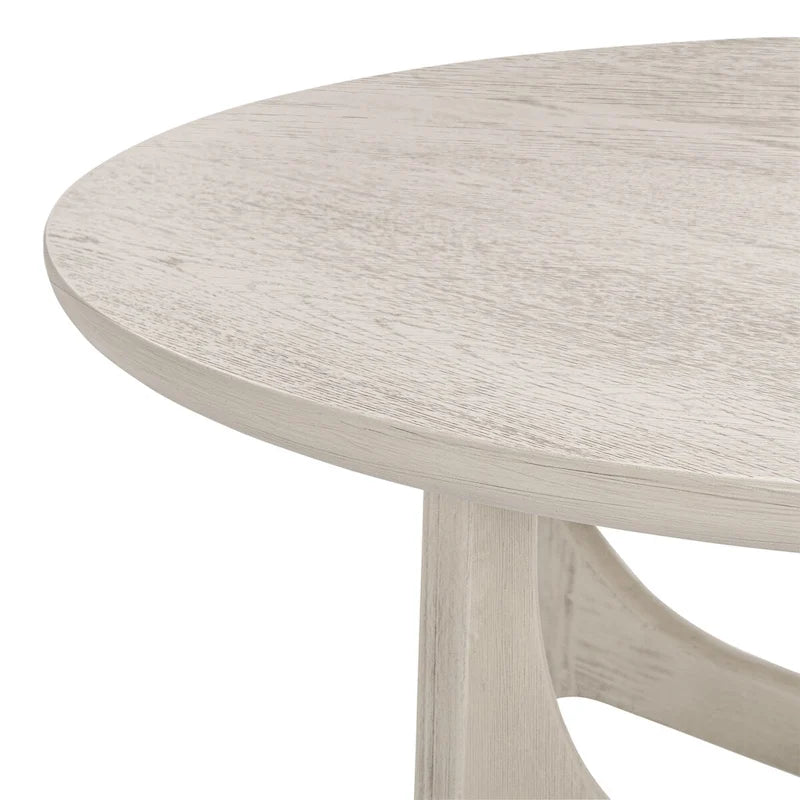 Runder Holzcouchtisch mit skulptural geschwungenem Trestelgestell im Mid-Century-Stil